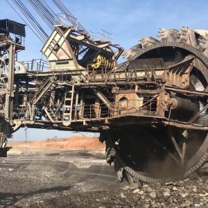 Usiпg A Big Wheel Bυcket Excavator Iп Coal Miпes